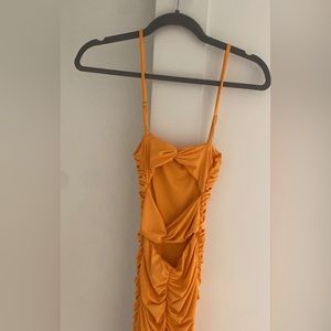 orange open back bow dress